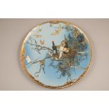 A pair of Mettlach wall plaques by Heinrich Schlitt, early 20th century. Circular decorated with