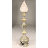 Chinese brass candle stick, turned column with a decorative pierced knop and raised on three feet,