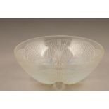 Rene Lalique opalescent coquilles pattern bowl, signed R. Lalique France No 3200, diameter 23.5cm.