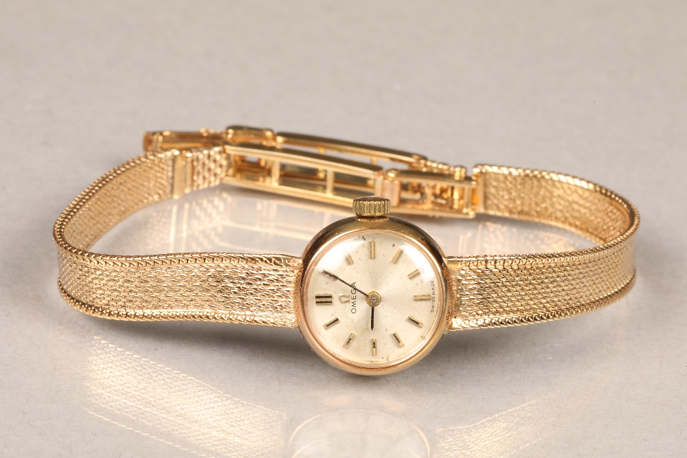 Ladies 9 carat gold Omega wrist watch with original 9 carat gold bracelet strap, champagne dial with