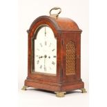 19th century walnut cased bracket clock, enamelled arched dial by Thompson, London, 39 cm high