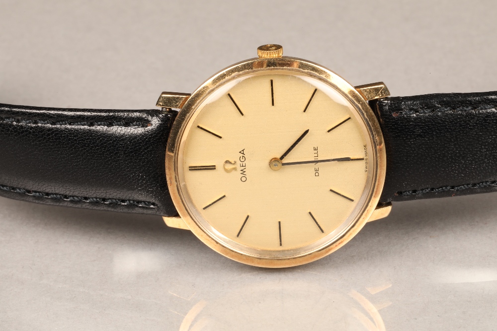 Gents 9 carat gold Omega de Ville wrist watch, champagne dial with hour markers, with replacement