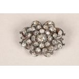 Diamond pierced cluster brooch, thirty one old cut diamonds mounted on heavily tarnished yellow