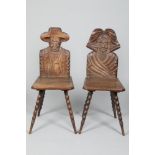 A pair of carved oak figure backed chairs, (i) carved lady figure to back panel (ii) carved