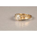 Ladies diamond solitaire ring, 1.2 carat old cut diamond in a scroll setting in unmarked yellow