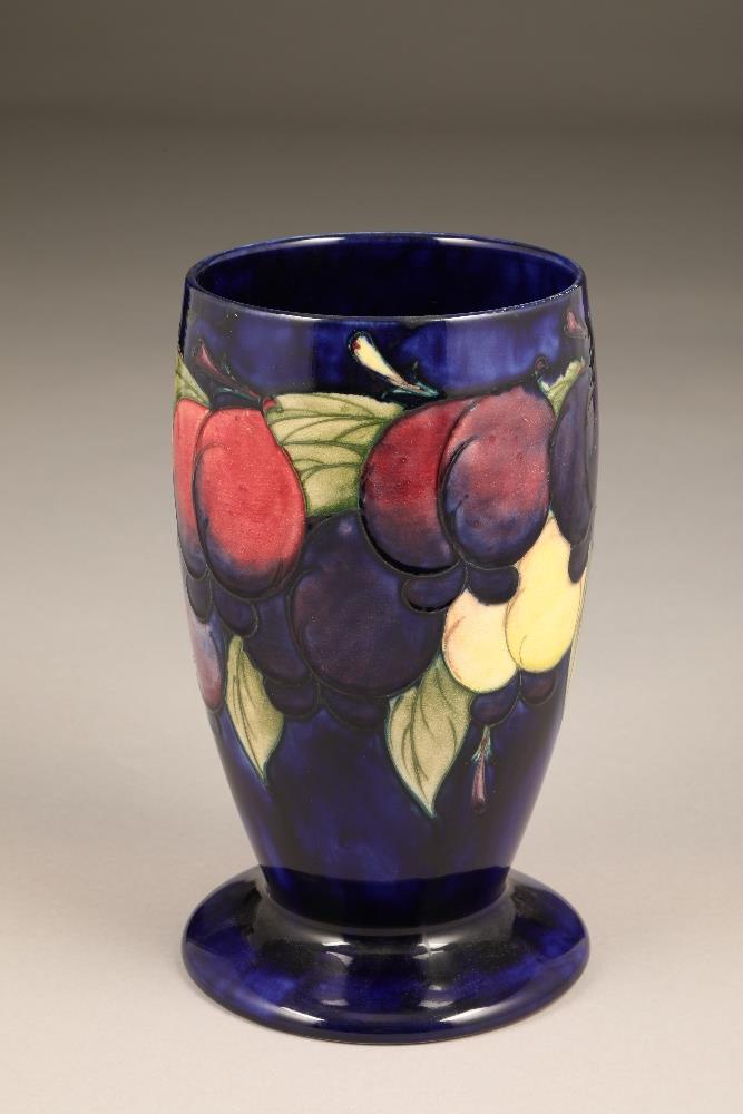 Moorcroft pottery vase, decorated in Wisteria Plum, signed and incised factory mark to base, 23cm