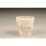 Belleek plant pot, three strand woven body with applied flowers, 9cm high.