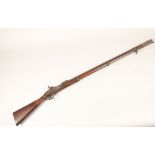 Enfield three band rifle dated 1864, with VR Cipher. The walnut stock has a crest on the but. The