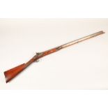 Percussion rifle, with cleaning rod. Total length 120cm, barrel length 79cm.