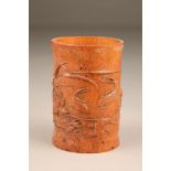 19th/20th century Chinese carved bamboo brush pot, decorated with pond lilies and carp, 18cm high.