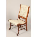 19th century Irish inlaid rosewood drawing room chair, turned and reeded front legs terminating in
