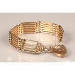 9 carat gold gate bracelet with heart shaped clasp, total weight 24.8g.