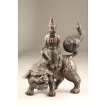 19th century Chinese bronze figure censor, Guanyin riding on the back of a lion dog, 33cm long, 39.