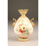 Nautilus porcelain vase, twin gilt handles, hand painted with autumn leaves and berries to one side,