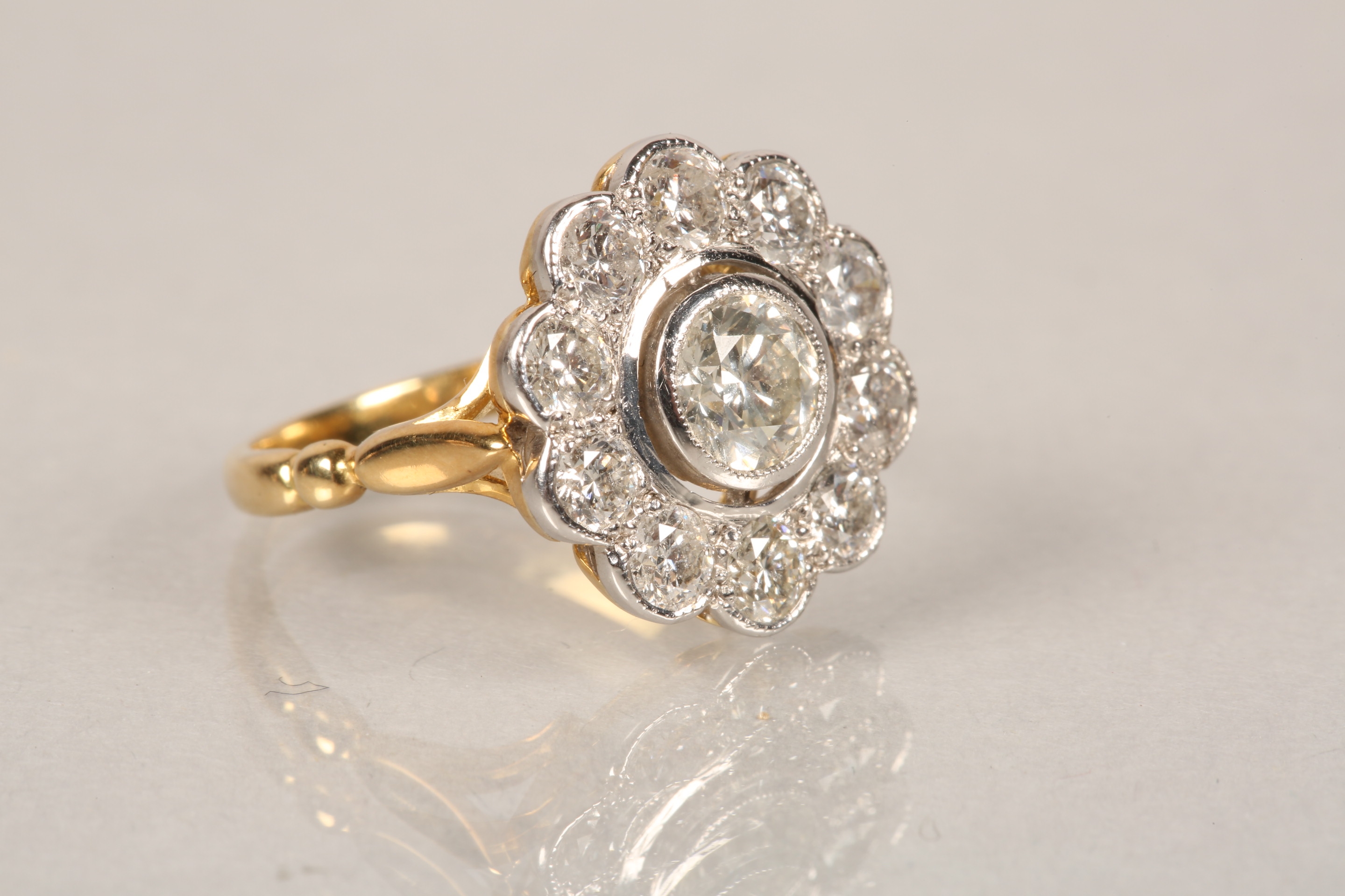 18 carat gold diamond cluster ring, daisy form, centre stone approx. 0.75 carat brilliant cut - Image 2 of 5