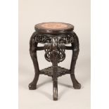 Chinese hardwood jardinière stand, rouge marble insert, carved bamboo apron supported on four carved