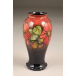 Moorcroft pottery vase, baluster shaped, decorated in clematis design, initialled and incised