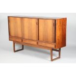 1960s Danish teak sideboard, comprising of three sliding cabinet doors, above three short drawers,