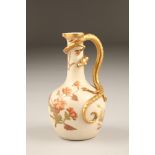 Royal Worcester ewer, bottle shaped, blushware with floral decoration and gilt dragon scroll handle,