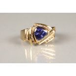 Ladies 18 carat yellow gold tanzanite ring, with five rows of small diamonds, ring size P/Q,
