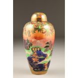 Wedgwood Fairyland lustre vase and cover, by Daisy Makeig-Jones, decorated in the 'Willow' pattern,