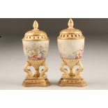 Pair Doulton vases and covers, egg shaped, supported on three dolphins and raised on stepped