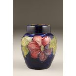 Moorcroft ginger jar, in the anemone pattern on blue ground, 15cm high.