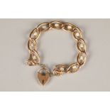 Ladies 15 carat gold bracelet, with set oval opal cabochons, 9 carat gold heart shaped clasp, 15g.