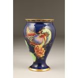 A Carlton ware crested bird and waterlily vase, pattern No.3529, baluster shape, on blue ground,