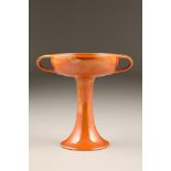 Moorcroft pottery art nouveau long stemmed vase, finished in orange enamel, shape No. 251, 21cm