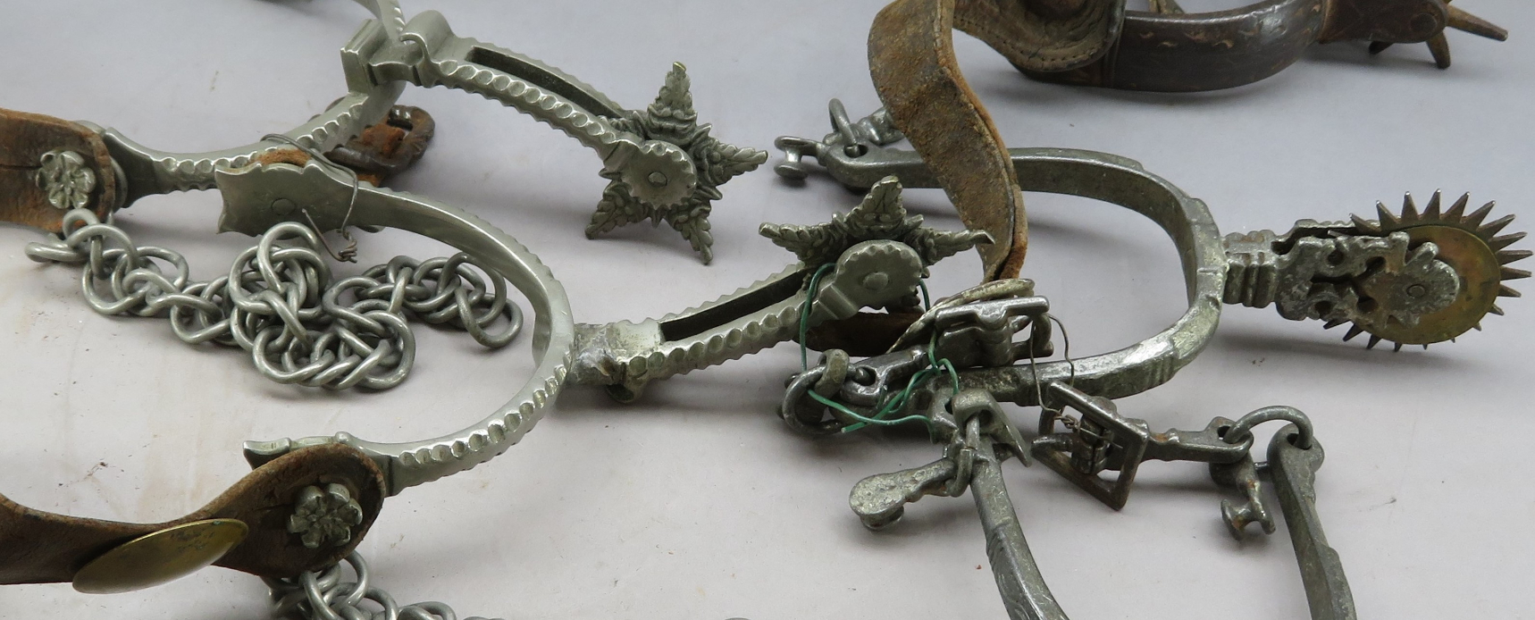 Ⓦ TWO PAIRS OF SOUTH AMERICAN ROWEL SPURS AND ANOTHER^ LATE 19TH CENTURY/20TH CENTURY