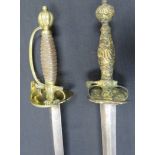 Ⓦ A SMALL-SWORD WITH BRASS BOATSHELL-GUARD^ CIRCA 1780 AND ANOTHER^ CIRCA 1760