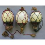 THREE OSTRICH EGGS WITH NORTH AFRICAN DECORATED MOUNTS, ALGERIA OR MOROCCO, 19TH CENTURY