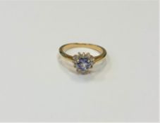 A 14ct yellow gold diamond set tanzanite heart shaped cluster ring,