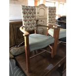 A tapestry upholstered oak framed chair