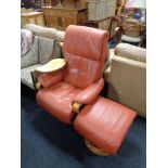 A Himolla Zero-Stress Medway Inka Wood leather reclining armchair,