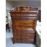 A 19th century continental mahogany secretaire chest CONDITION REPORT: Moulding to