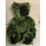 A Charlie Bear, green teddy bear.