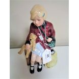 A Royal Doulton figure, The Girl Evacuee, HN 2023.