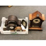 A pine cased mantel clock,