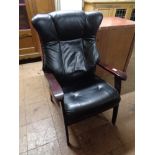 A black leather contemporary armchair