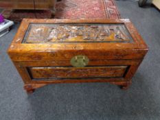 A carved camphor wood chest