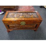 A carved camphor wood chest