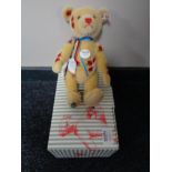 A Steiff blonde mohair teddy bear to commemorate the Armed Forces, boxed.