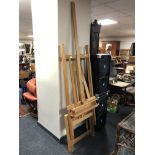 A large folding artist's easel with set square.