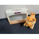 A Worlds of Wonders Teddy Ruxpin figure, circa 1980's depicting Grubby, part boxed.