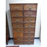 An early twentieth century Stolzenberg sixteen drawer cabinet CONDITION REPORT: