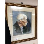 A gilt framed watercolour portrait by J.