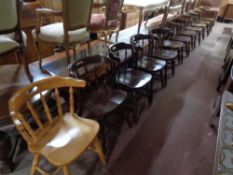 Twelve wooden pub chairs