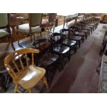 Twelve wooden pub chairs